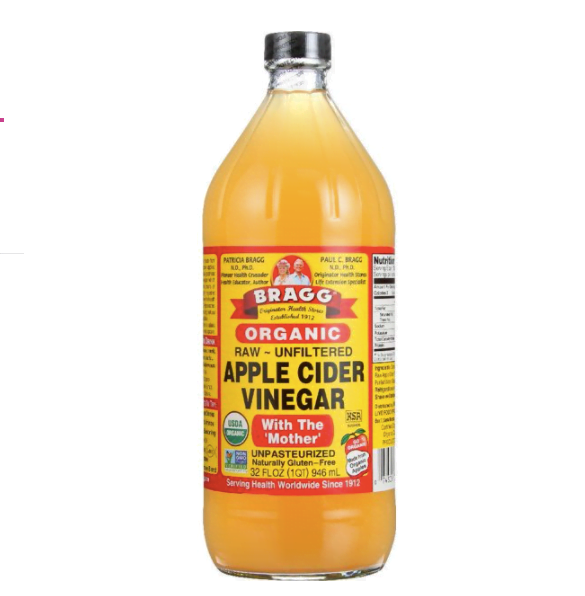 a photo of apple cider vinegar in a bottle and how to speed up your metabolism after 40