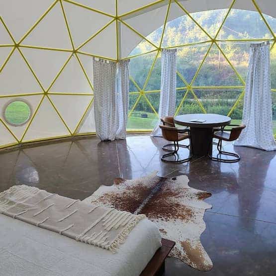 a photo of a glamping dome and 5 seriously cool glamping spots to visit in 2023