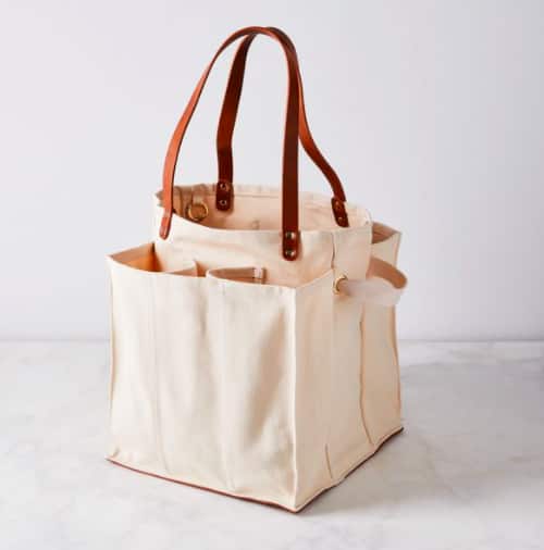 a photo of reusable grocery bags and 9 easy ways to live a more eco-friendly life