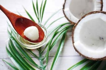 a photo of coconut oil and 10 Things to Improve Your Aging Teeth