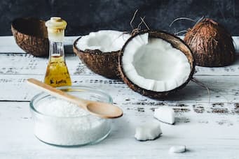 A photo of coconut oil and 10 Things to Improve Your Aging Teeth